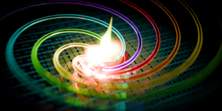 Artistic impression of the deep-strong coupling achieved. Rainbow colored spirals on a microstructured surface.